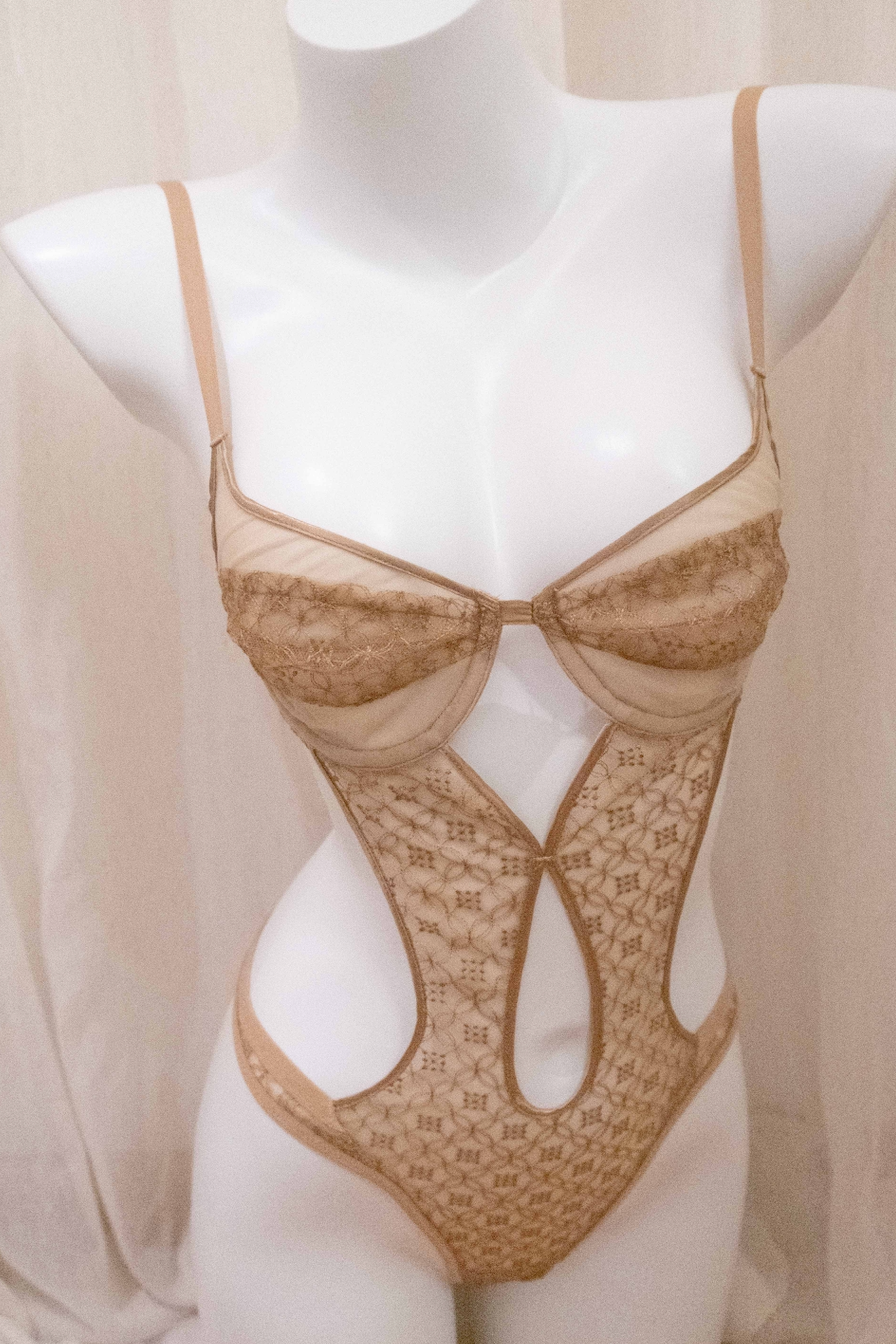 golden lingerie suit