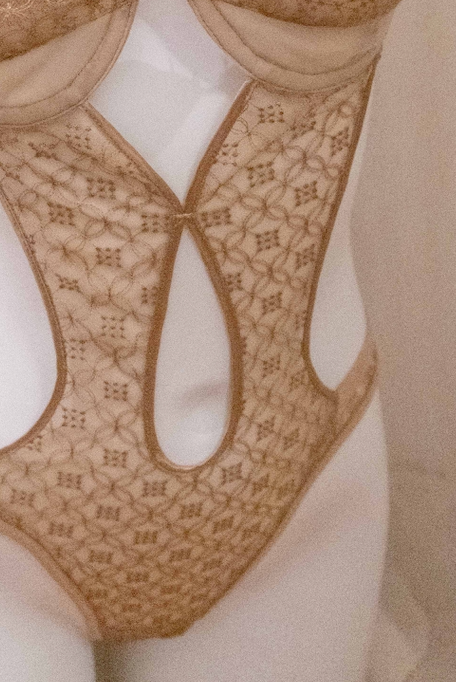 golden lingerie suit